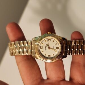 Decade gold watch